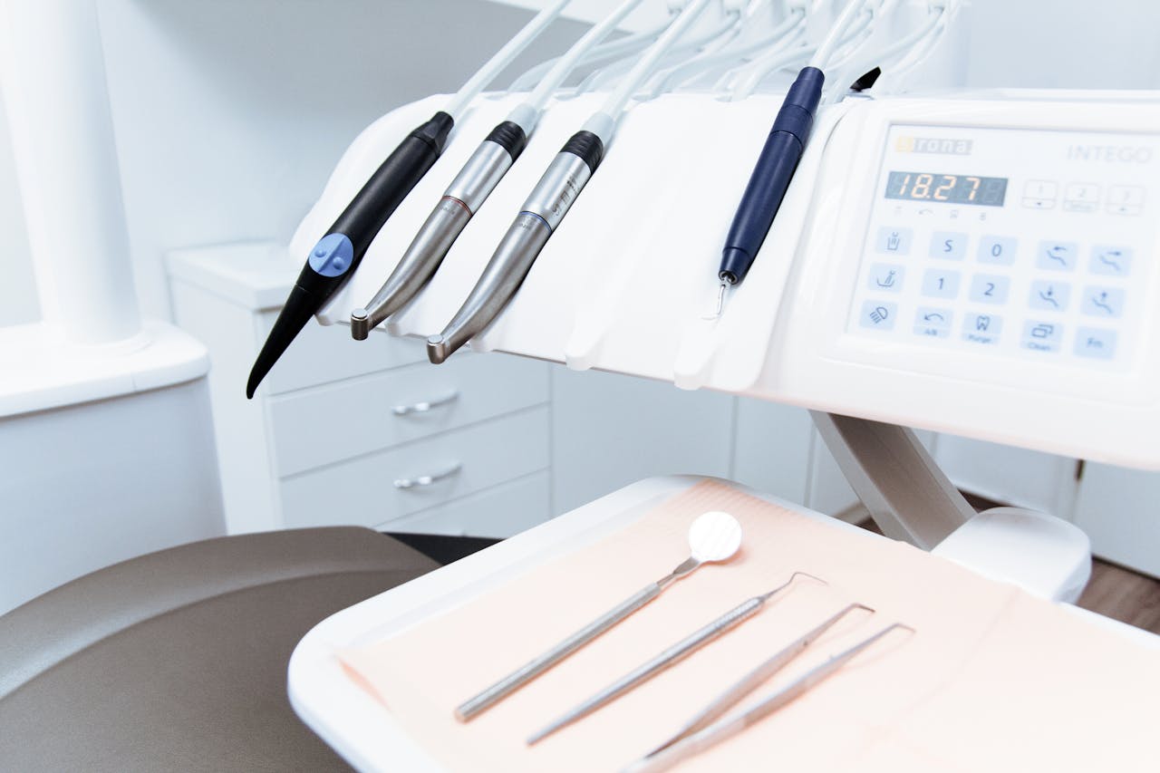 heros-img Clean and professional dental office setup with tools ready for patient treatment.